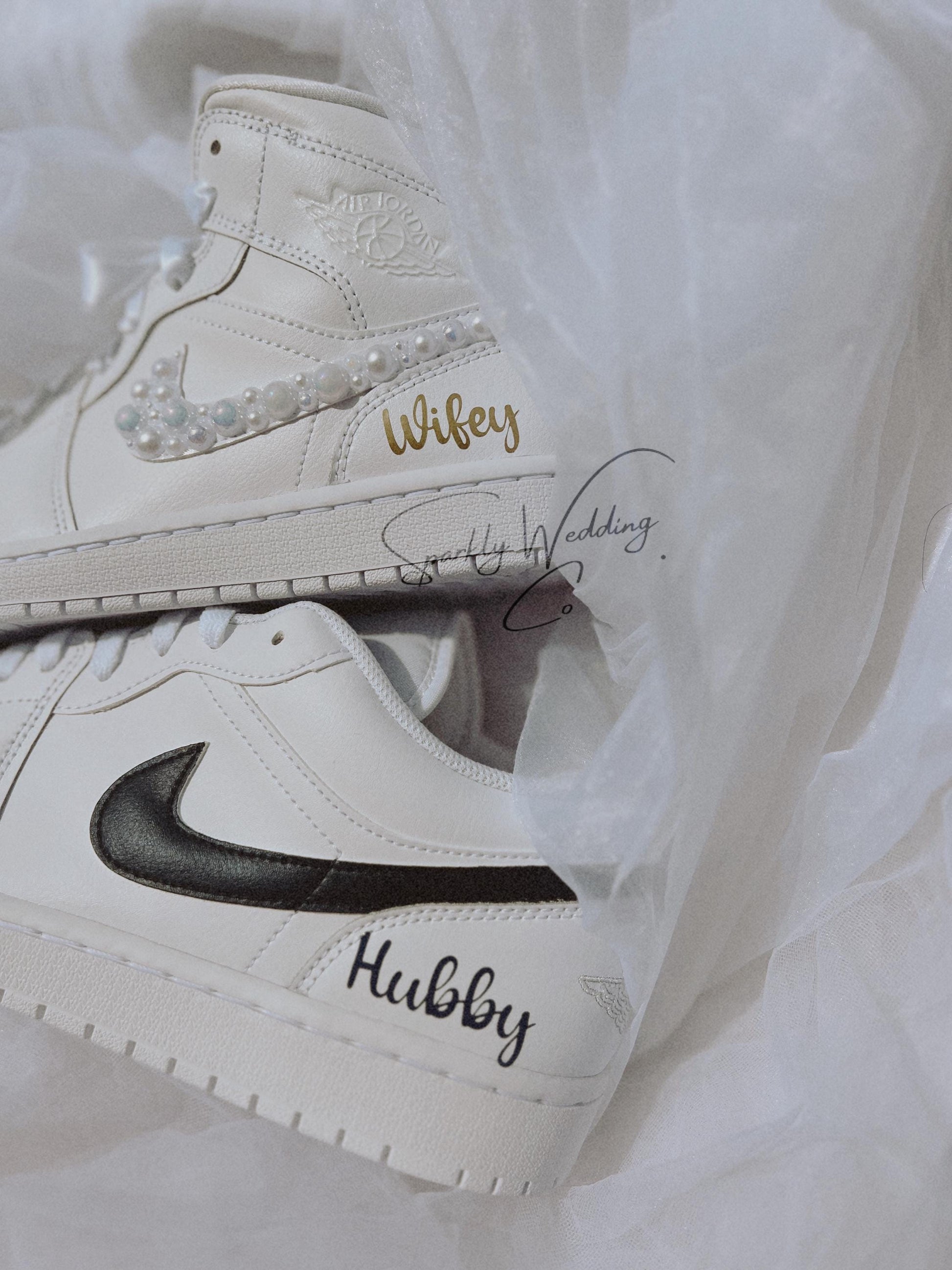 Couples wedding sneaker bundle featuring bridal Air Jordan Mid with pearls and groom Air Jordan Low