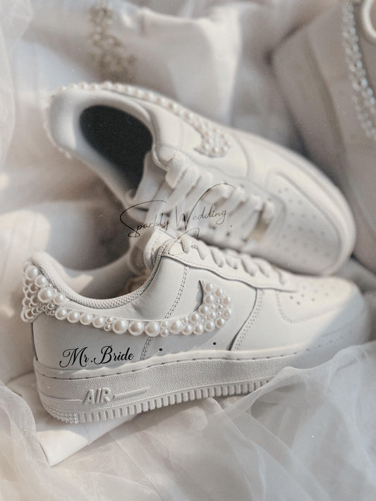 Custom white pearl wedding sneakers for bride with pearls on the swoosh and back

