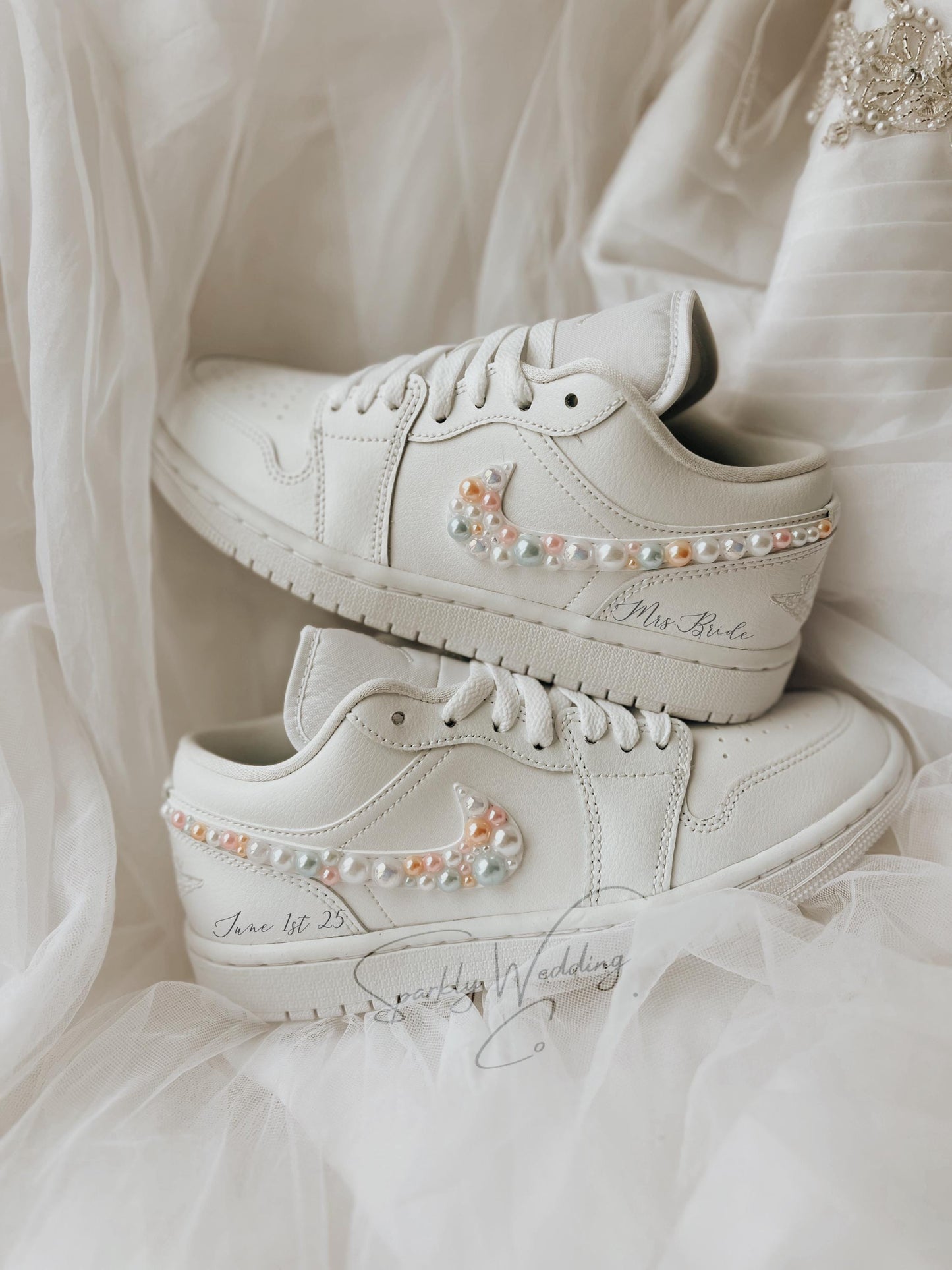 Top view of elegant white Air Jordan Low bridal sneakers designed for wedding day comfort and style.