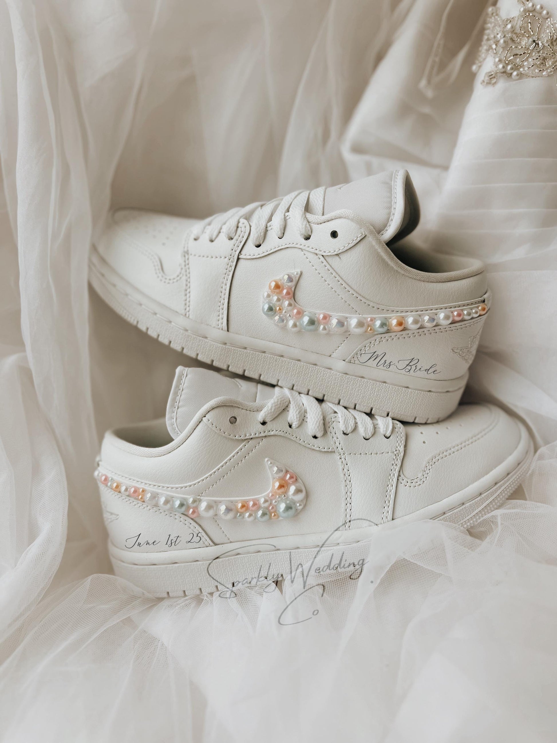 Top view of elegant white Air Jordan Low bridal sneakers designed for wedding day comfort and style.