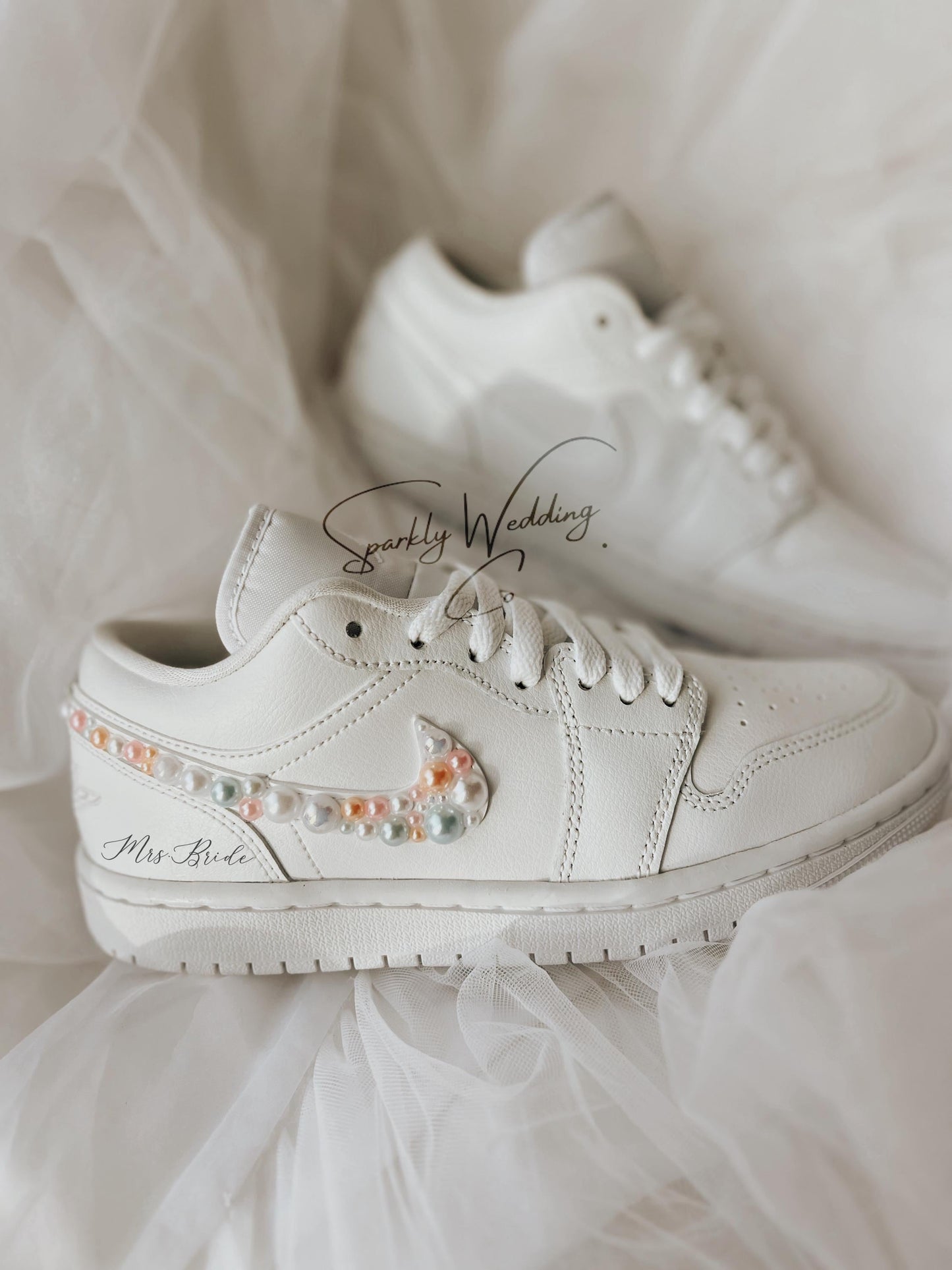 Personalized Nike Air Jordan Low wedding sneakers with pearl embellishments, custom bridal shoes designed for comfort and elegance.
