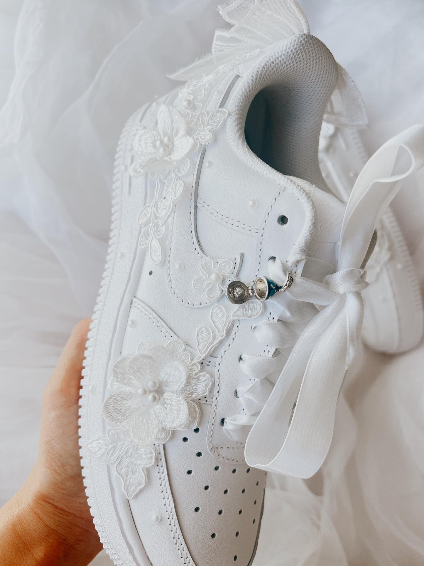 Removable wedding shoe charm accessory designed to add a delicate, elegant bridal detail to custom wedding sneakers.