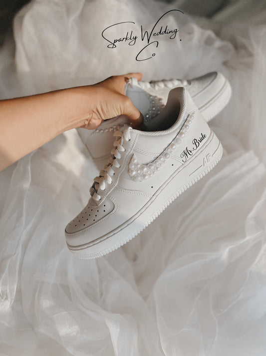 White pearl wedding sneakers in Air Force 1 style with hand-applied pearls on the outer swoosh, custom bridal shoes for brides